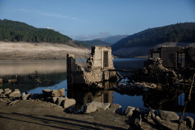 Remains of a house in shallow water