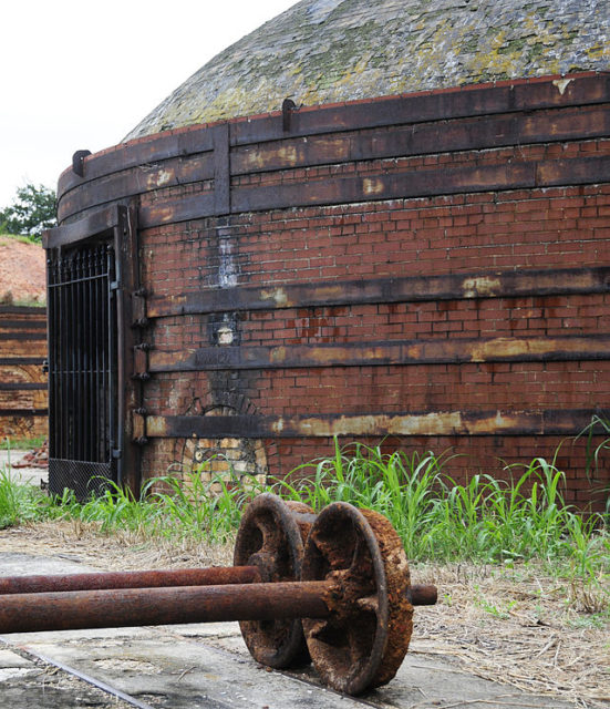 Rusty metal outside one of the beehive kilns at Guignard Brick Works