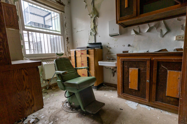 Dentist's office chair in the middle of a room