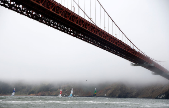 Underneath the Golden Gate Bridge looking onto the water.