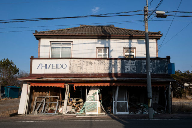 Damaged storefront in Futaba