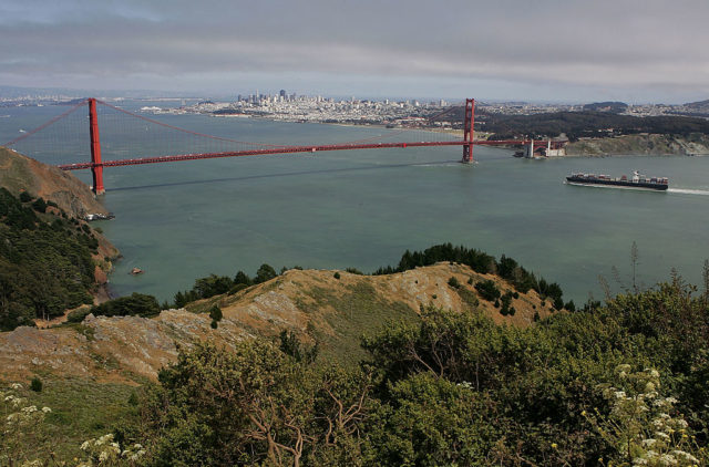 View looking down at the entrance to San Fransisco Bay with the Golden Gate Bridge. 