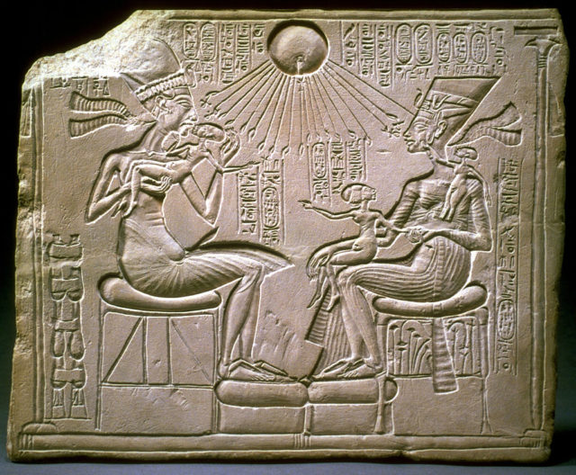 Stone engraving of Akhenaten, Nefertiti and their children