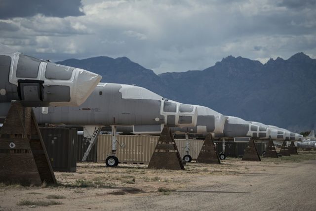 Row of damaged Rockwell B-1 Lancers parked outside