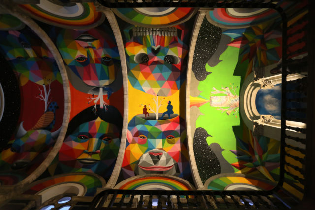 Rainbow murals painted on the ceiling of the Kaos Temple skate park