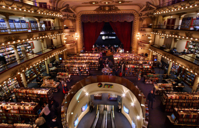 An old cinema with bookcases inside