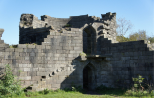 Ruins of Liverpool Castle with blue sky behind