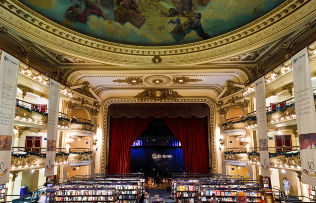 View of the stage and bookshelves at El Ateneo