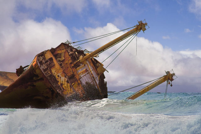 SS American Star on her side off the coast of the Canary Islands