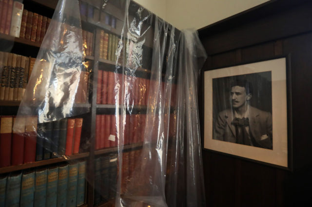 Portrait of architect Charles Rennie Mackintosh in the Hill House library