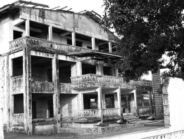 An abandoned crumbling building in Harper