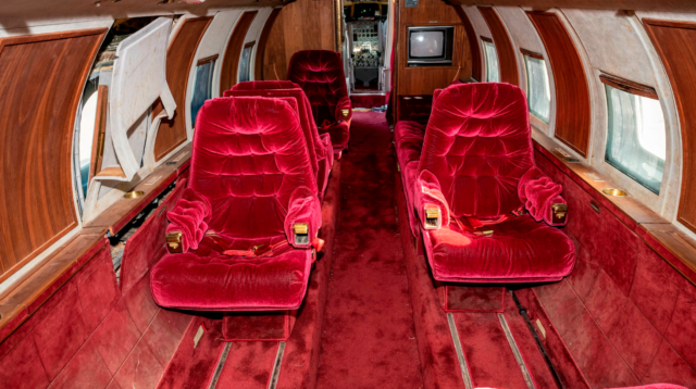 Pink passenger seats in the interior of Elvis Presley's Lockheed 1329 JetStar