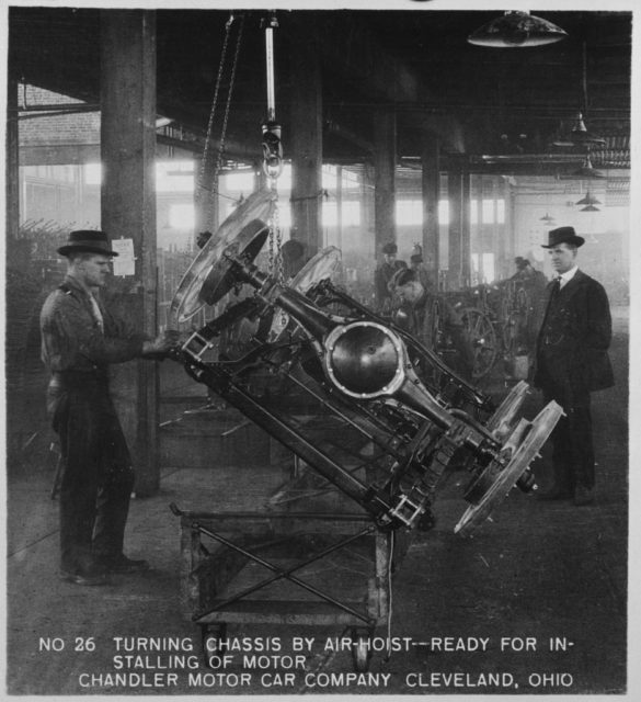 Two men in an automobile factory in Cleveland, Ohio