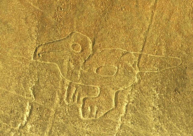 Aerial view of what appears to be a bird etched into the ground located at the Nazca archaeological site