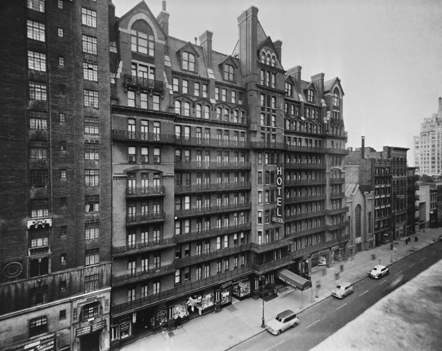 Black and white photo of the exterior of the Chelsea Hotel.