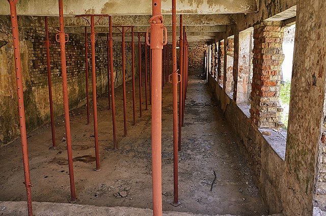 Remains of the dining hall at Spaç Prison