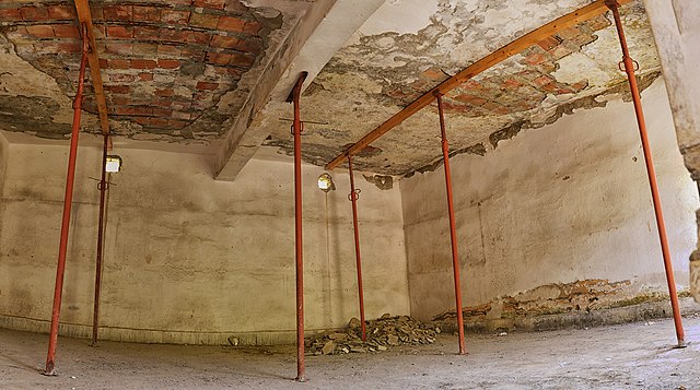 Remains of the prisoner dormitory at Spaç Prison