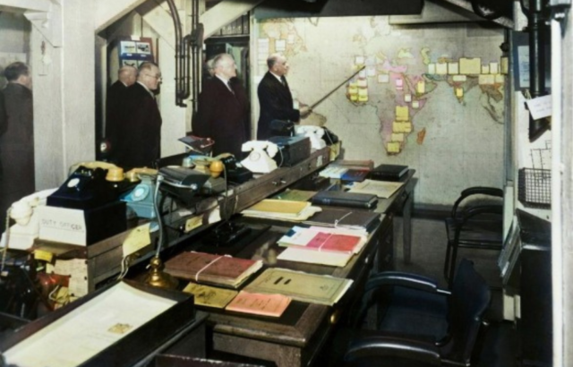 Government officials standing together in a room