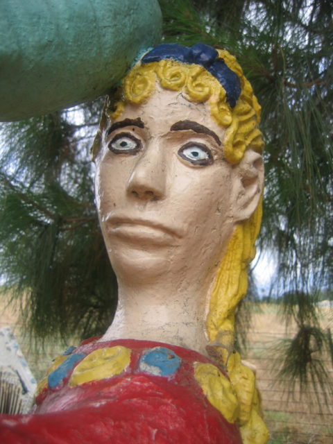 A sculpture of a woman's face.