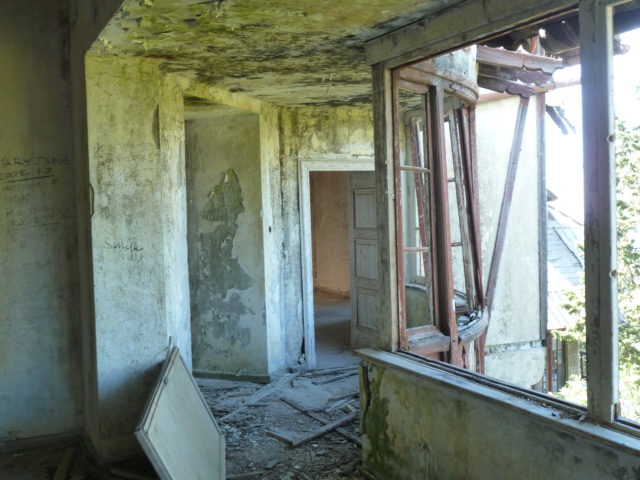 Abandoned and decrepit hallway of the Mussolini villa. 