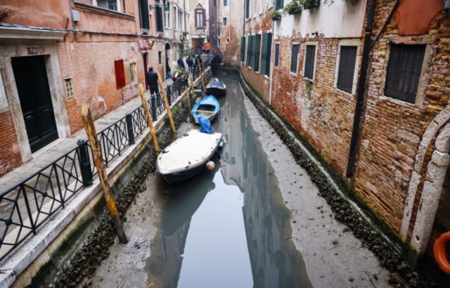 The muddy, dried up canals of Venice