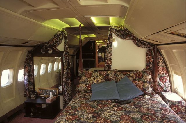 Interior bedroom decorated with floral fabric inside Jo Ann Ussery's converted plane home.