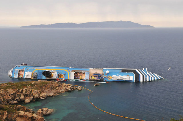 Aerial view of the COsta Concordia sunk near Giglio Island.