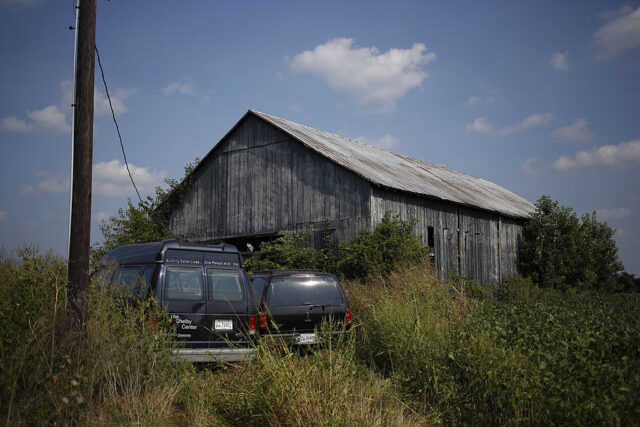 a barn in a field