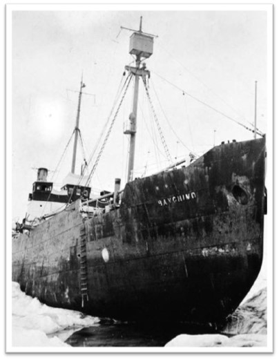 SS Baychimo being lifted out of the water by a crane. 