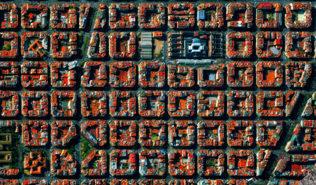 A satellite image of an area in Barcelona, formed into near-perfect square blocks.