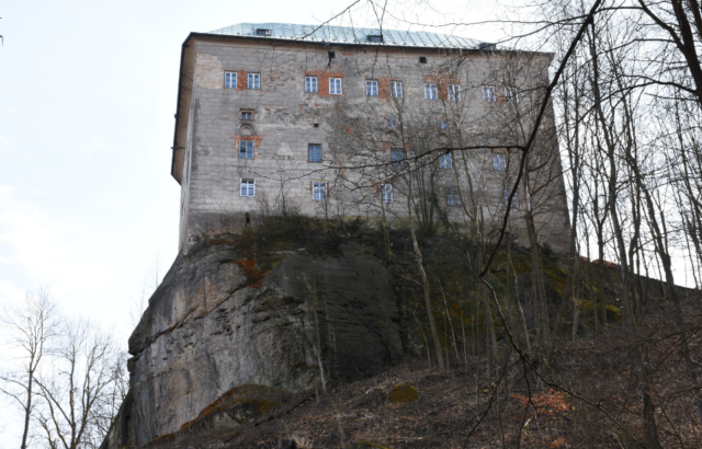 View looking up at Houska Castle.