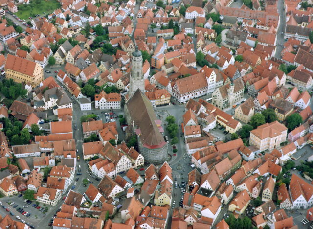 An aerial view of the city of Nordlingen, including St. George's Church.