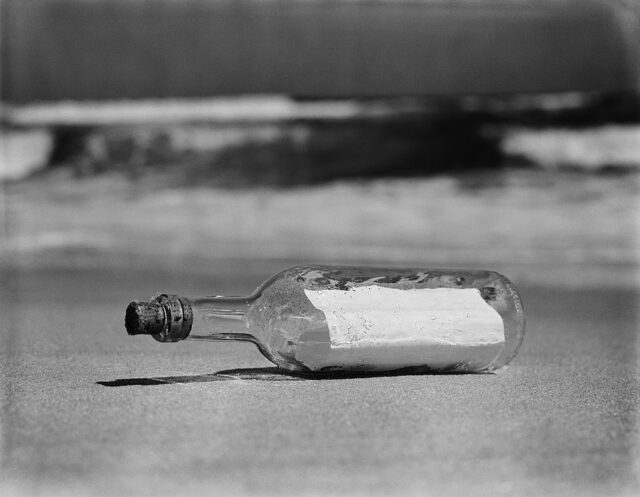 Message in a bottle on the beach