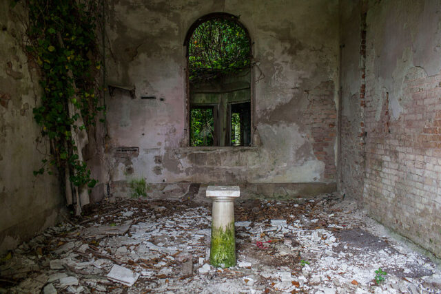 Concrete debris strewn across a room