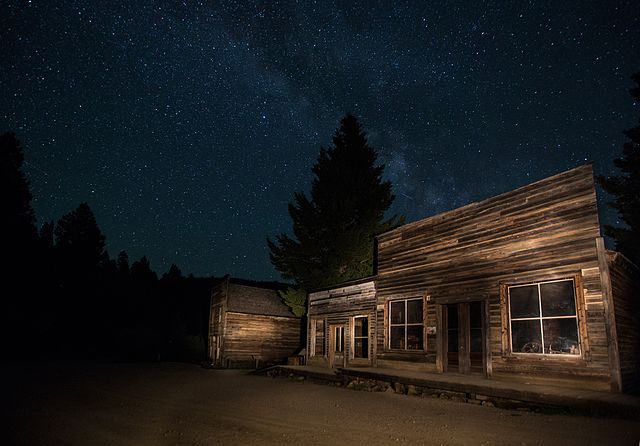 Wooden building lit in the night