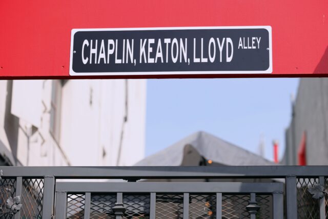 Sign stating 'Chaplin, Keaton, Lloyd Alley' above the alley on September 29, 2021 on the occasion of the naming of the alley in the three actor's honor.