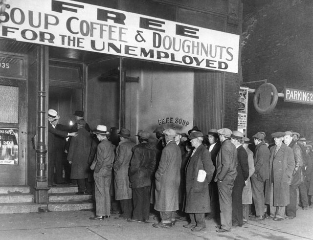 Men lined up outside of Al Capone's soup kitchen