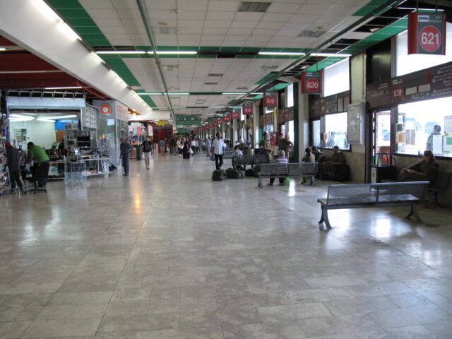 People walking in a bus station