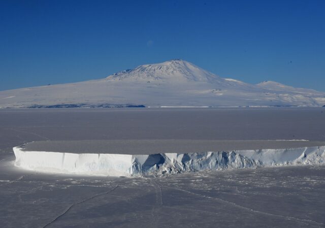 Mount Erebus in the distance, an ice sheet in front.
