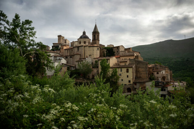 View of Cocullo, Italy through foliage