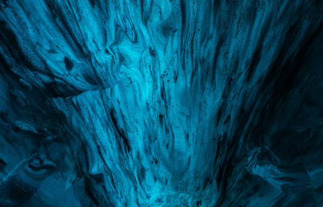 Blue ice texture in the caves of a glacier near Iceland, North Atlantic.