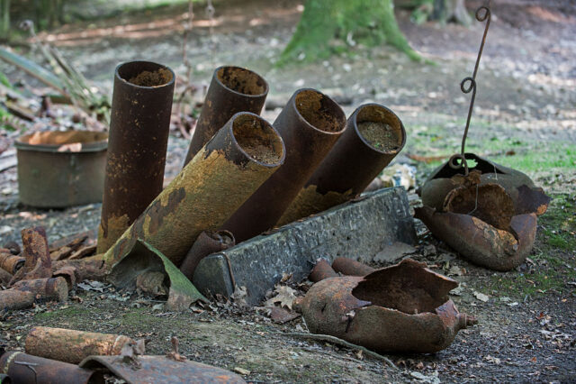 World War I-era Livens projectors laid together on the ground