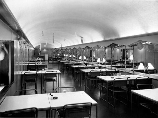 Rows of tables lining the length of one of the tunnels at the Kingsway Telephone Exchange