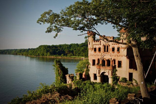 View of Bannerman Castle, a body of water to the left.