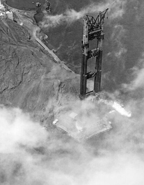 Aerial view of the Marin Tower of the Golden Gate Bridge under construction.