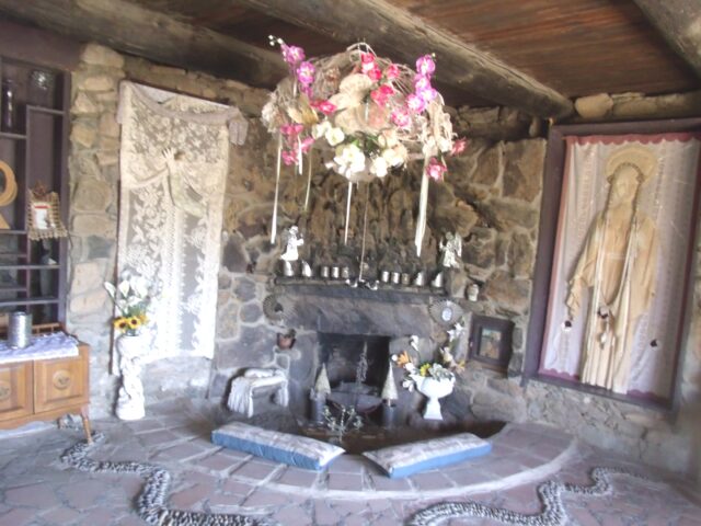 A chapel inside a stone room.