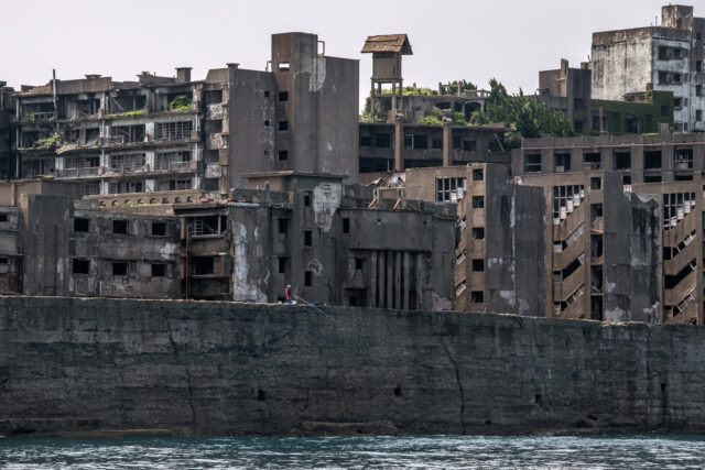 Abandoned concrete structures on an island.