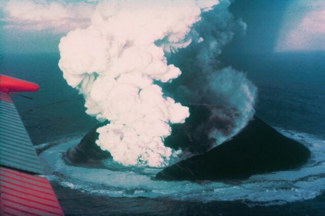 Aerial view of a volcano eruption.