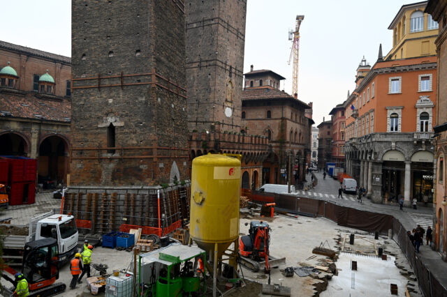 The base of Garisenda tower with construction around it.