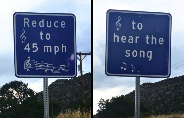 Highway road signs the read "Reduce to 45 mph to hear the song"